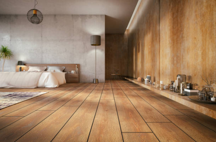 Chambre très spacieuse avec parquet et revêtement des murs en bois